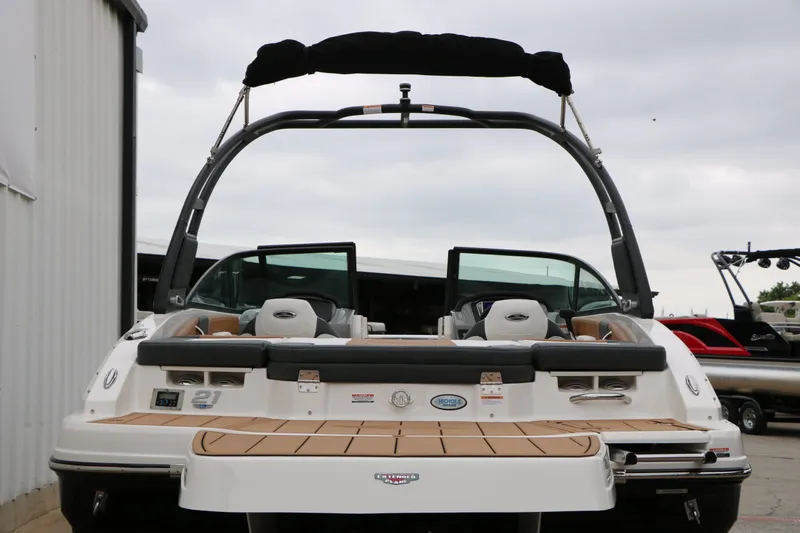 Slide: The Image of Rear view of 2026 Chaparral 21 SSi boat with modern design. - 9
