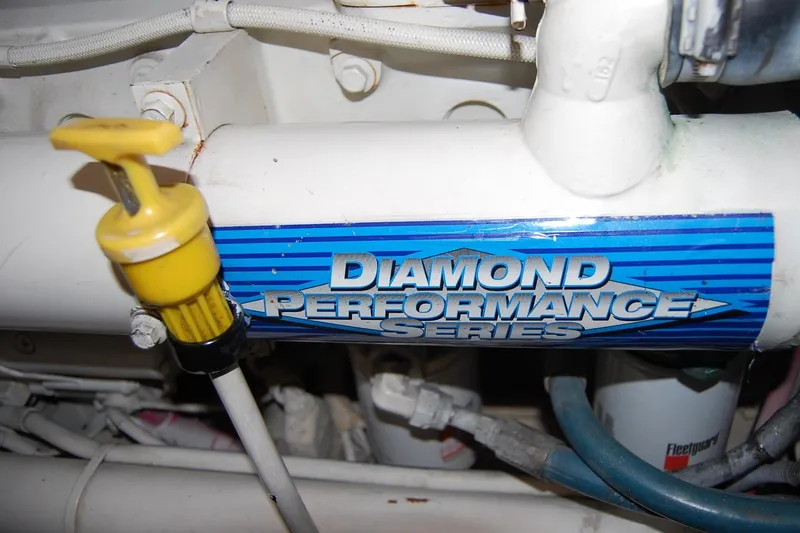 Slide: The Image of Engine component of 2004 Tiara Yachts 3500 Open, featuring "Diamond Performance Series" label. - 19