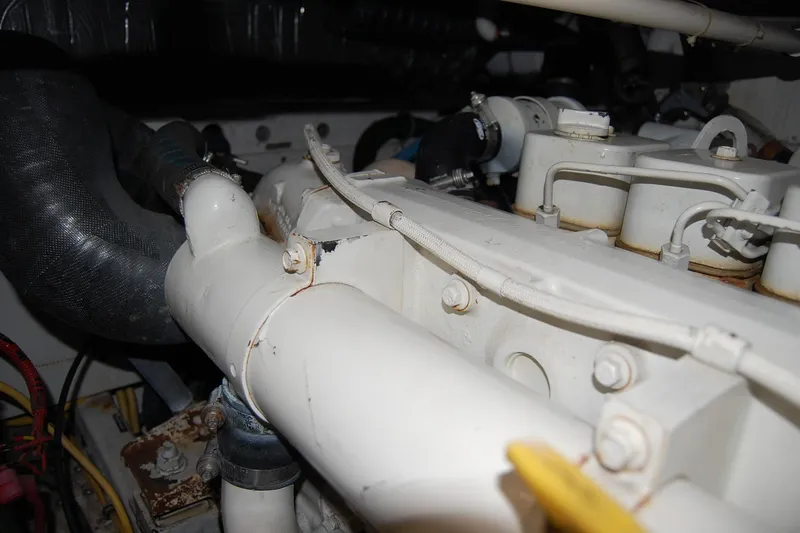 Slide: The Image of Engine compartment of a 2004 Tiara Yachts 3500 Open, showcasing mechanical components. - 20