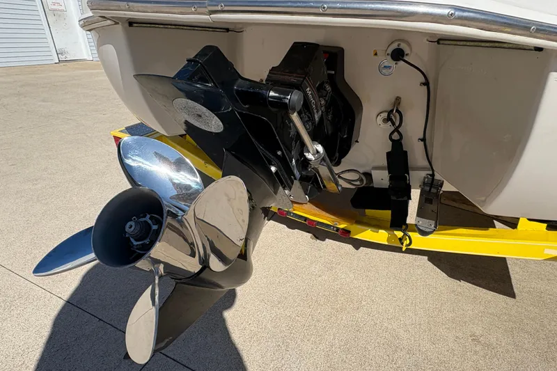 Slide: The Image of 2005 Tahoe Q4 SF boat propeller and engine detail on a trailer. - 10