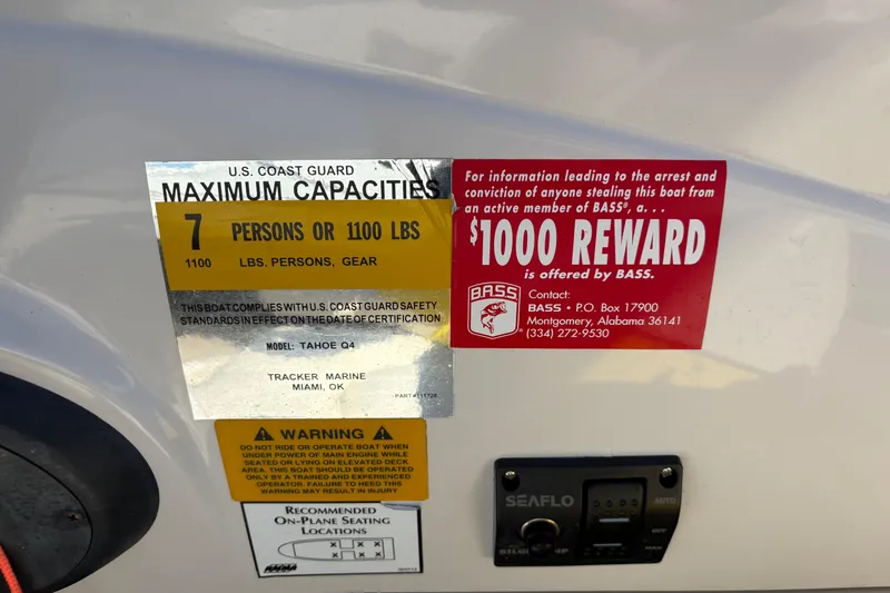 Slide: The Image of 2005 Tahoe Q4 SF boat capacity and reward notice, featuring safety and contact information. - 25
