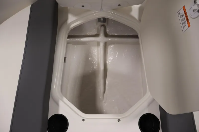 Slide: The Image of Storage compartment of 2026 Bayliner Element E16 boat, open and empty. - 18