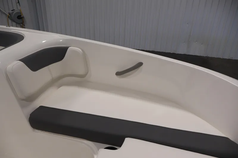 Slide: The Image of Interior seating of 2026 Bayliner Element E16 boat, featuring sleek white and gray design. - 19