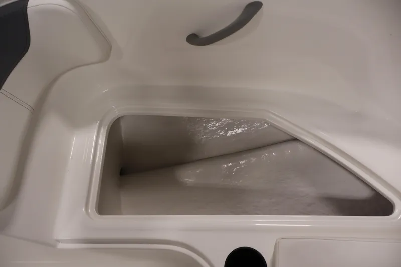 Slide: The Image of Storage compartment in 2026 Bayliner Element E16 boat interior. - 20