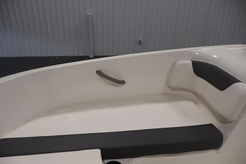 Slide: The Image of 2026 Bayliner Element E16 boat interior with white and black seating. - 21