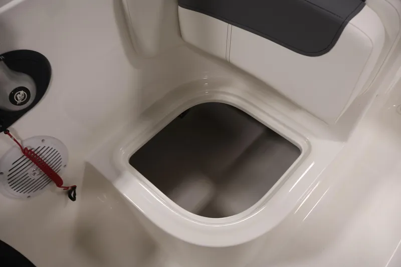 Slide: The Image of 2026 Bayliner Element E16 boat interior storage compartment and seating area. - 30