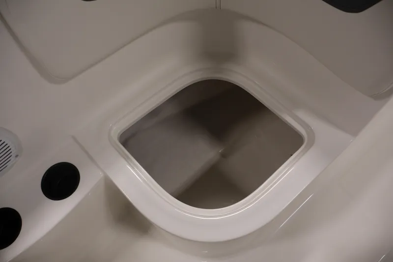 Slide: The Image of Storage compartment in 2026 Bayliner Element E16 boat interior. - 32