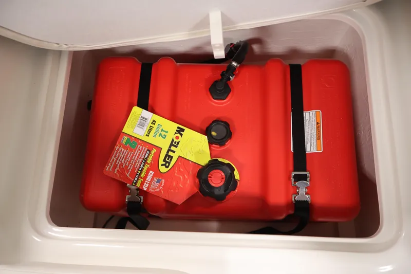 Slide: The Image of Red fuel tank in Bayliner Element E16 boat storage compartment, 2026 model. - 35
