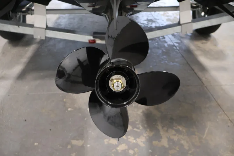 Slide: The Image of Close-up of a 2026 Bayliner Element E16 boat propeller on a trailer. - 42