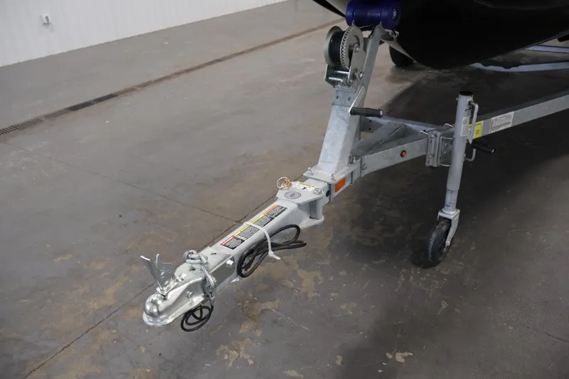 Slide: The Image of Trailer hitch of a 2026 Bayliner Element E16 boat on a concrete floor. - 43