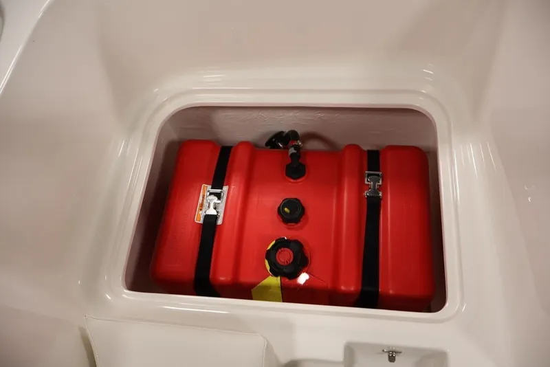 Slide: The Image of Red fuel tank in 2026 Bayliner Element E16 boat compartment. - 29