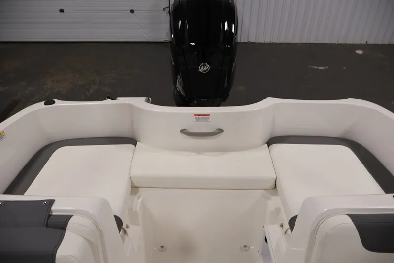 Slide: The Image of 2026 Bayliner Element E16 boat interior with seating and outboard motor. - 38