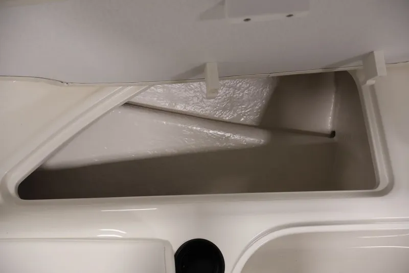 Slide: The Image of Storage compartment of 2026 Bayliner Element E16 boat, showcasing interior space. - 21