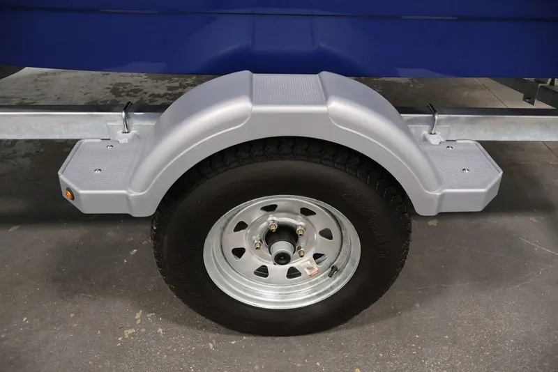Slide: The Image of Trailer wheel and fender of 2026 Bayliner Element E16 boat. - 22