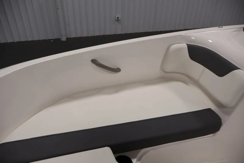 Slide: The Image of Interior seating of 2026 Bayliner Element E16 boat, featuring sleek white and black design. - 25