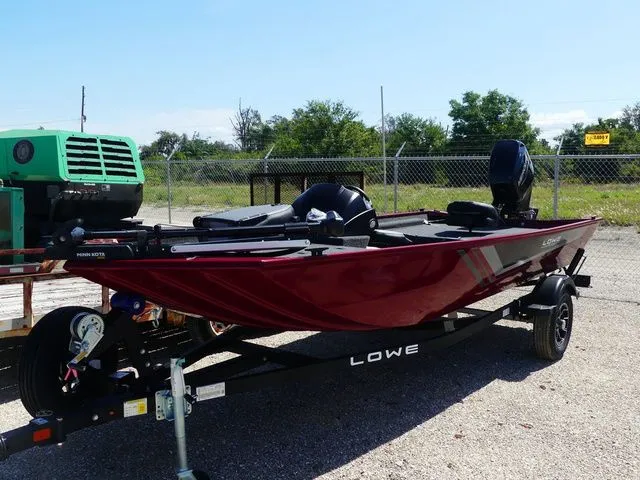 The Image of Red Lowe Skorpion 17 boat, 2026 model, parked on trailer. - 1