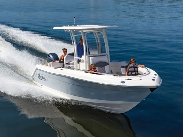 The Image of 2023 Robalo R222 Explorer boat cruising on calm water. - 1