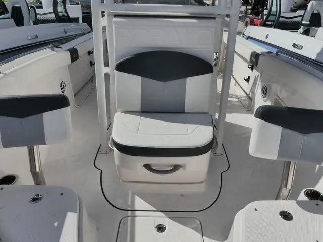 Slide: The Image of Interior of 2023 Robalo R222 Explorer boat with seating. - 11