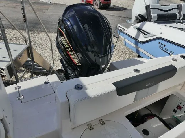 Slide: The Image of 2023 Robalo R222 Explorer with outboard motor. - 4