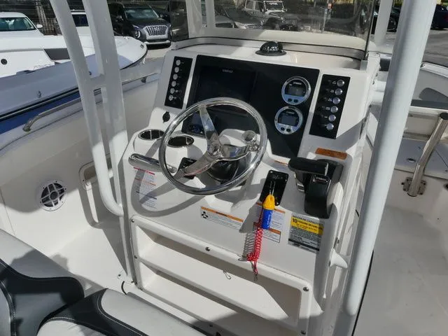 Slide: The Image of 2023 Robalo R222 Explorer boat helm console. - 6