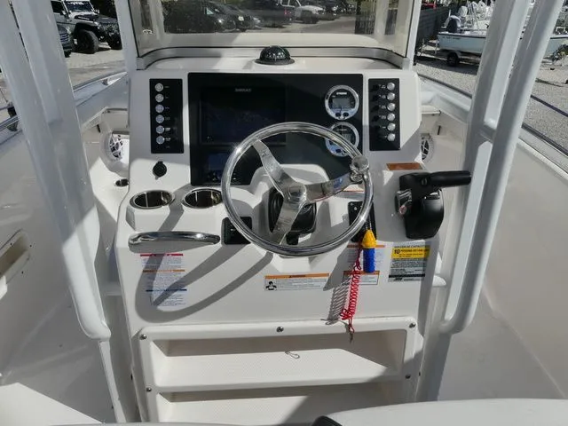 Slide: The Image of 2023 Robalo R222 Explorer boat helm console. - 7