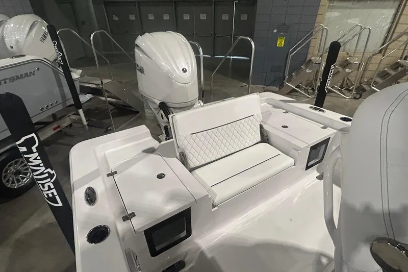 Slide: The Image of 2026 Sportsman Masters 247OE Bay Boat interior with seating and Yamaha engines. - 3