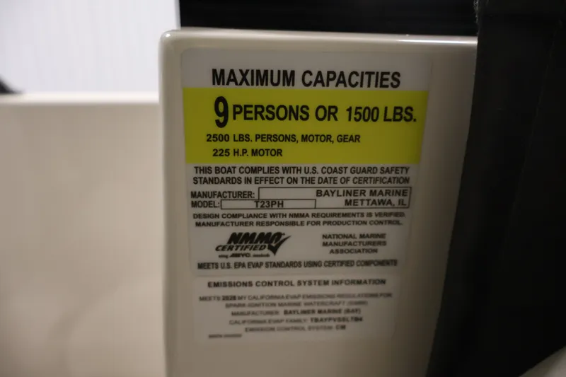 Slide: The Image of Capacity label on 2026 Bayliner Trophy T23 Pilothouse, 9 persons or 1500 lbs limit. - 28