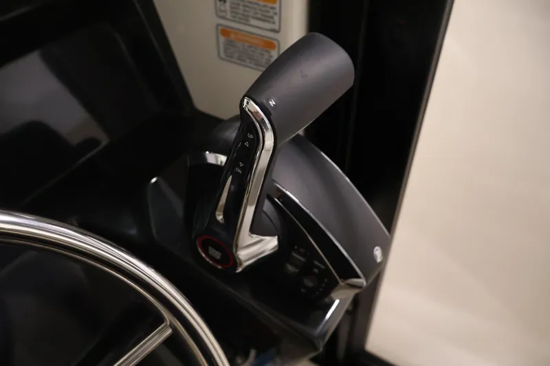 Slide: The Image of Throttle control of 2026 Bayliner Trophy T23 Pilothouse boat, featuring sleek design and functionality. - 27