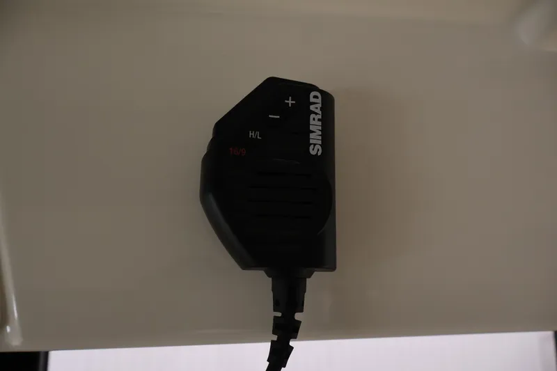Slide: The Image of Simrad radio microphone on 2026 Bayliner Trophy T23 Pilothouse boat. - 37