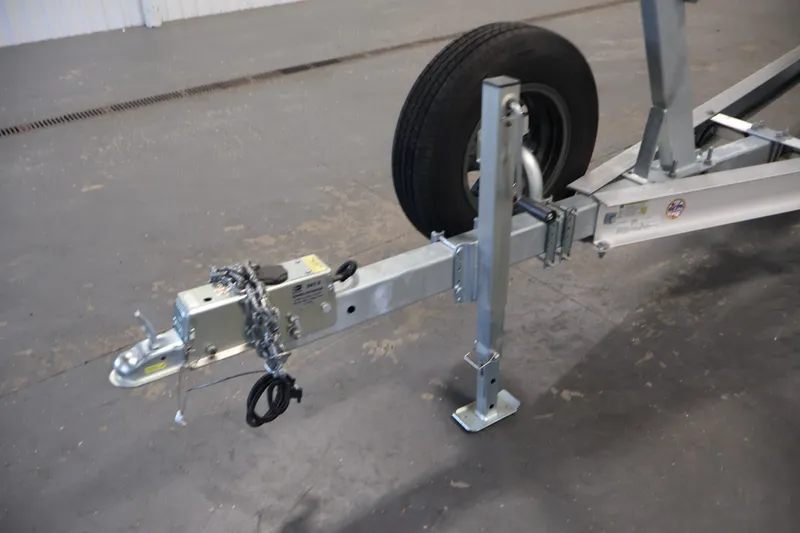 Slide: The Image of Trailer hitch and wheel assembly for 2026 Bayliner Trophy T23 Pilothouse boat. - 59