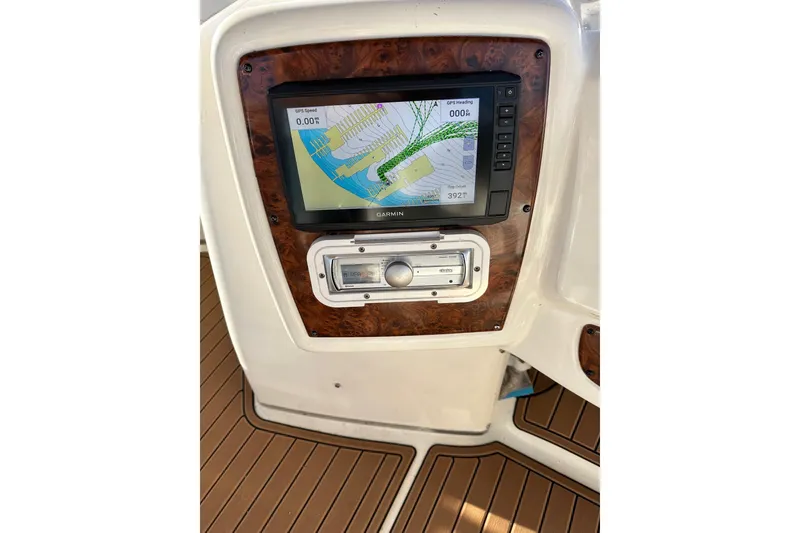 Slide: The Image of Dashboard of a 2003 Meridian 381 Sedan with GPS navigation display. - 11