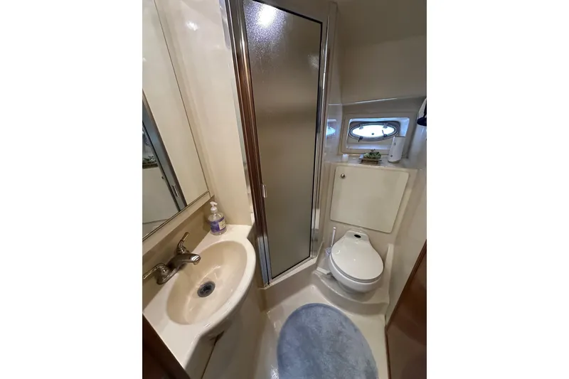 Slide: The Image of Bathroom interior of 2003 Meridian 381 Sedan yacht with shower and sink. - 29