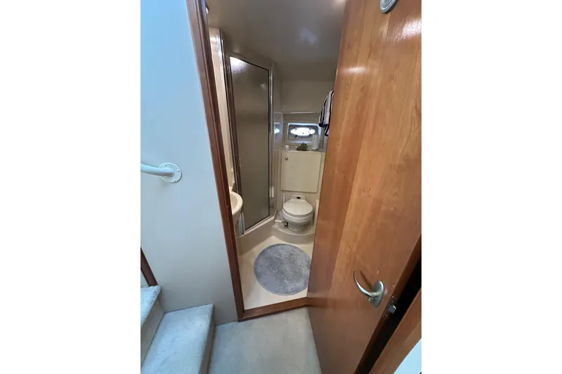 Slide: The Image of Bathroom interior of 2003 Meridian 381 Sedan yacht with shower and toilet. - 31