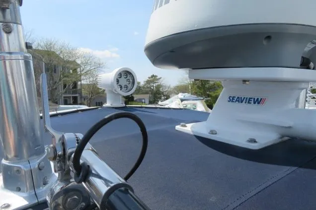 Slide: The Image of 2006 Sea Hunt Triton 260 boat radar and equipment on deck. - 40