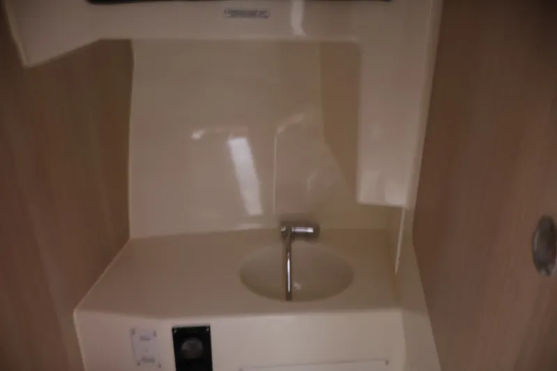 Slide: The Image of Interior sink area of 2026 Bayliner Trophy T25 Pilothouse boat. - 62