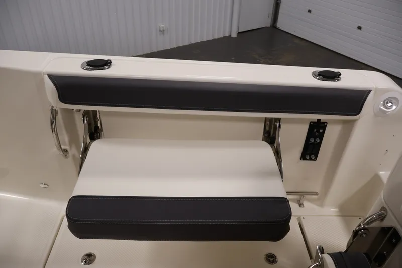 Slide: The Image of 2026 Bayliner Trophy T25 Pilothouse interior seating with sleek design and modern features. - 69