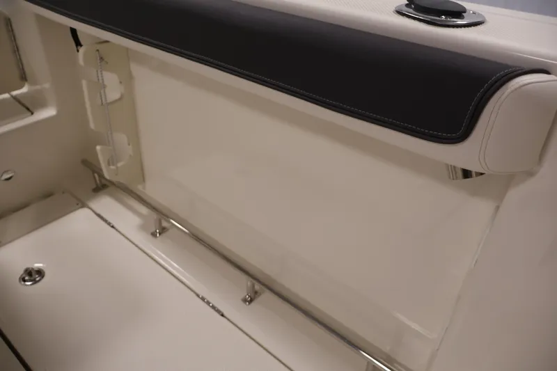Slide: The Image of 2026 Bayliner Trophy T25 Pilothouse interior detail with sleek seating and modern design. - 67