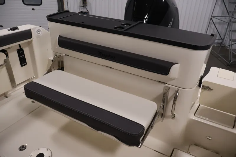 Slide: The Image of 2026 Bayliner Trophy T25 Pilothouse interior with foldable seating and modern design. - 66