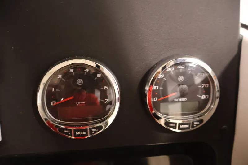 Slide: The Image of Dashboard gauges of 2026 Bayliner Trophy T25 Pilothouse, showing RPM and speed. - 43