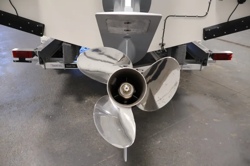 Slide: The Image of Propeller of 2026 Bayliner Trophy T25 Pilothouse on trailer, rear view. - 74