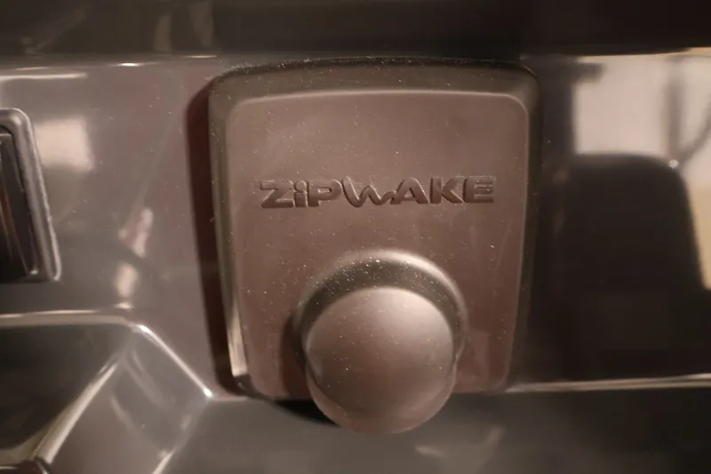 Slide: The Image of Zipwake trim control on 2026 Bayliner Trophy T25 Pilothouse boat. - 45