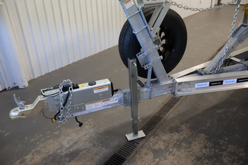 Slide: The Image of Trailer hitch and wheel assembly for 2026 Bayliner Trophy T25 Pilothouse boat. - 76