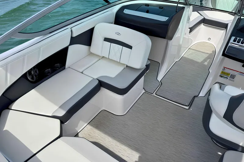 Slide: The Image of Interior of a 2019 Regal 21 OBX boat with stylish seating and modern design. - 16