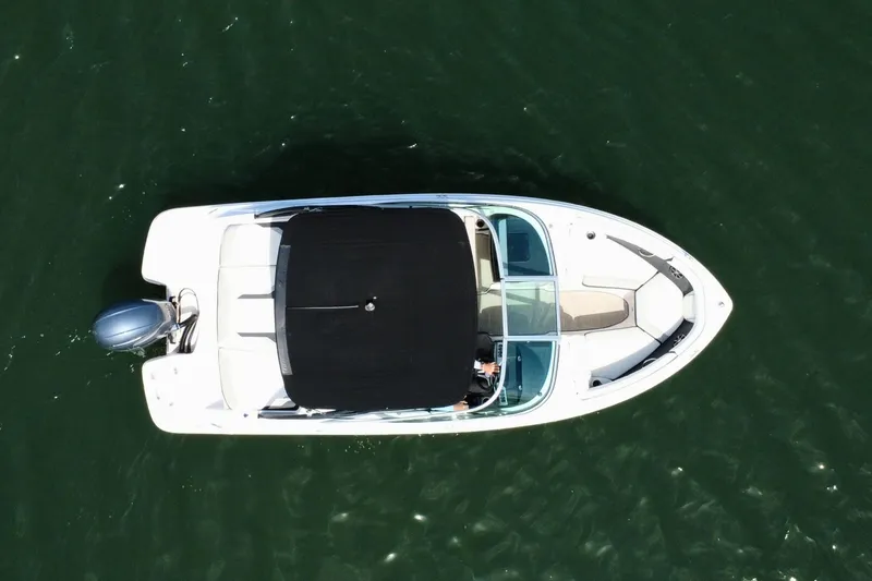 Slide: The Image of Overhead view of 2019 Regal 21 OBX boat on water. - 8