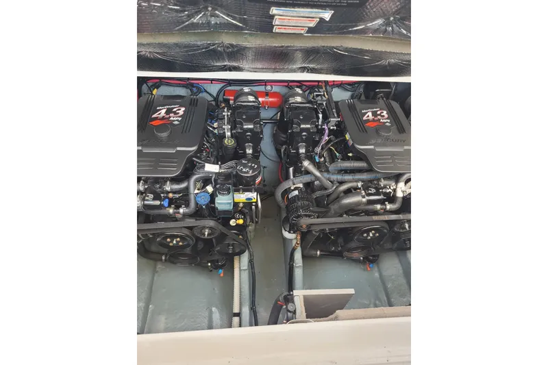 Slide: The Image of Twin MerCruiser 4.3 MPI engines in a 2004 Searay 280 Sundancer boat. - 17