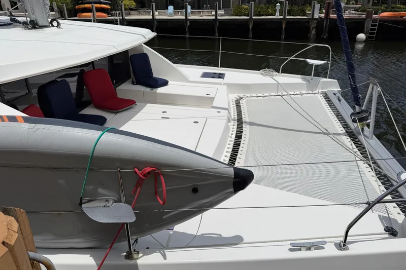 Slide: The Image of 2020 Leopard 40 catamaran with trampoline deck and seating area at dock. - 13