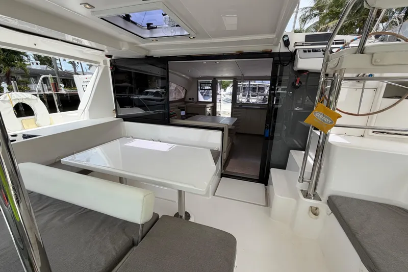 Slide: The Image of Interior view of a 2020 Leopard 40 catamaran with seating and table. - 21