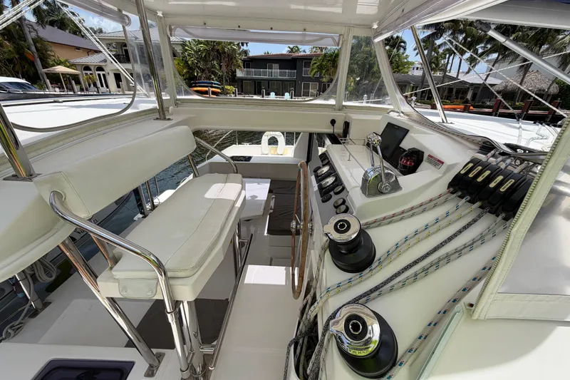 Slide: The Image of Cockpit of 2020 Leopard 40 catamaran with helm, seating, and control panels. - 31
