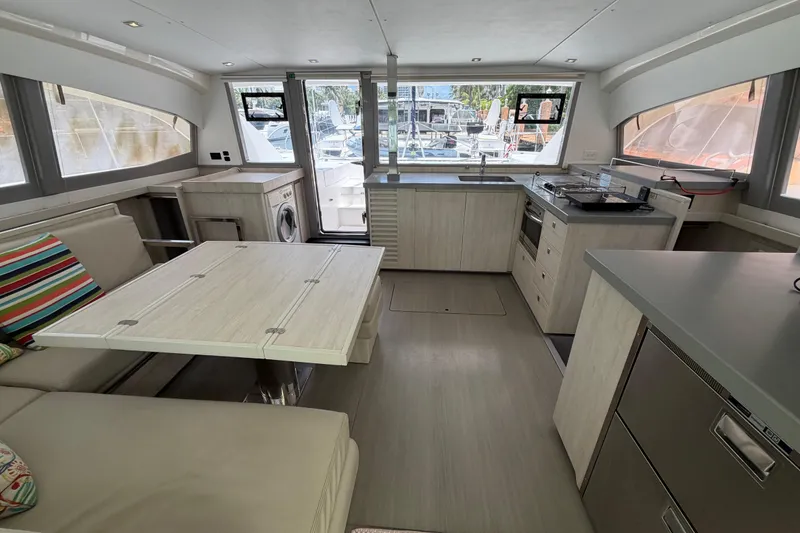Slide: The Image of Modern interior of 2020 Leopard 40 catamaran with kitchen and seating area. - 35