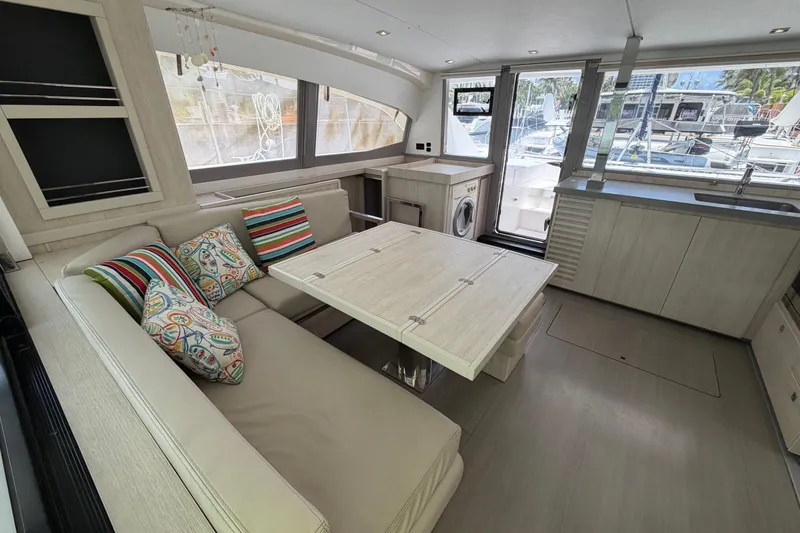 Slide: The Image of Modern interior of 2020 Leopard 40 catamaran with stylish seating and colorful cushions. - 36